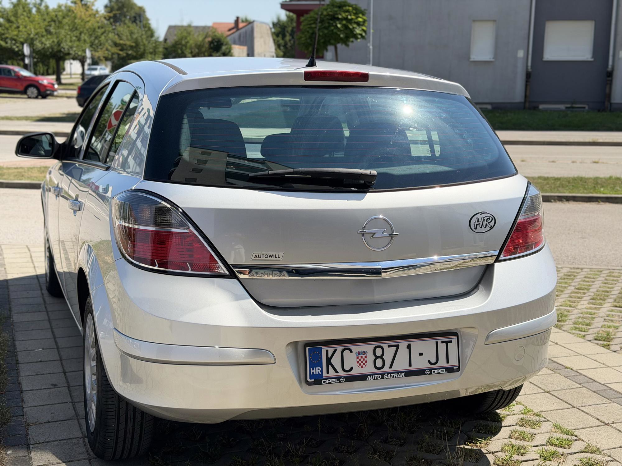 OPEL ASTRA 1,4 benzin KLIMA,samo 128tkm,2012.reg skoro god dana,potvrda km, fotografija 4